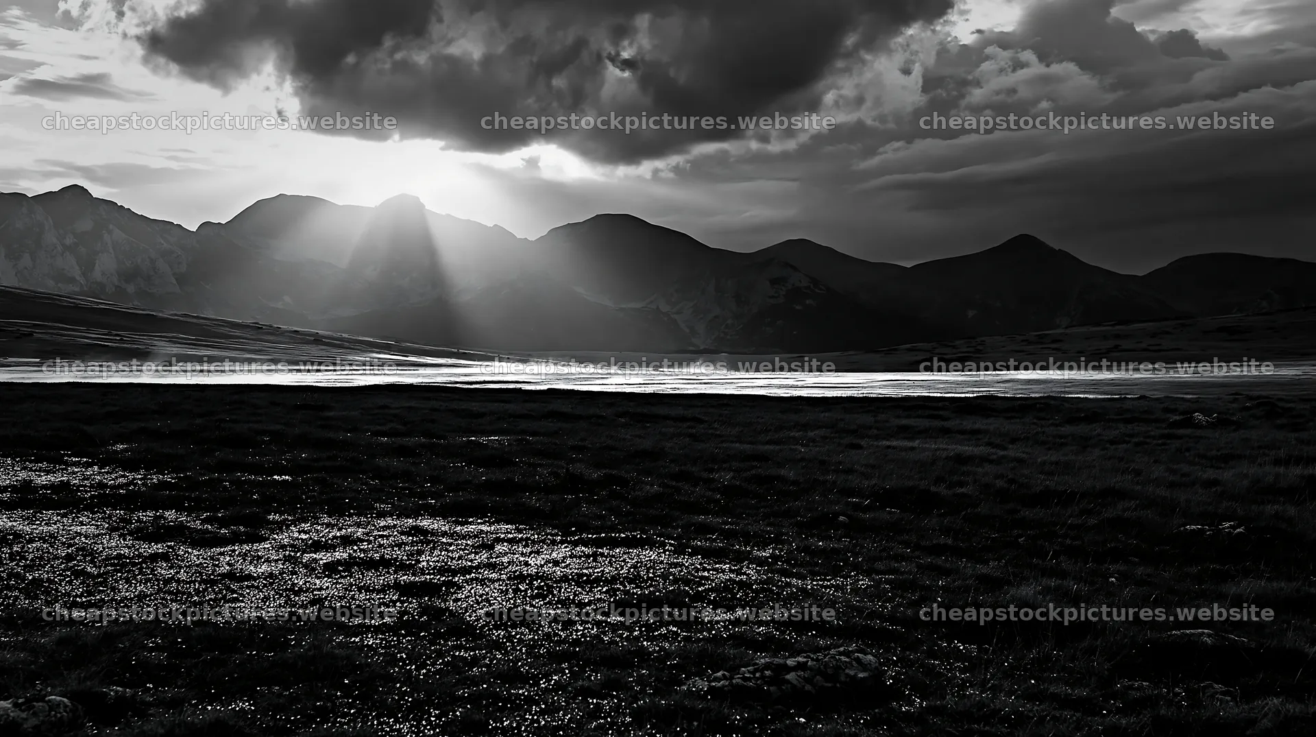 Light rays on Bucegi Mountains meadow at sunset – stock pictures 10608x5938