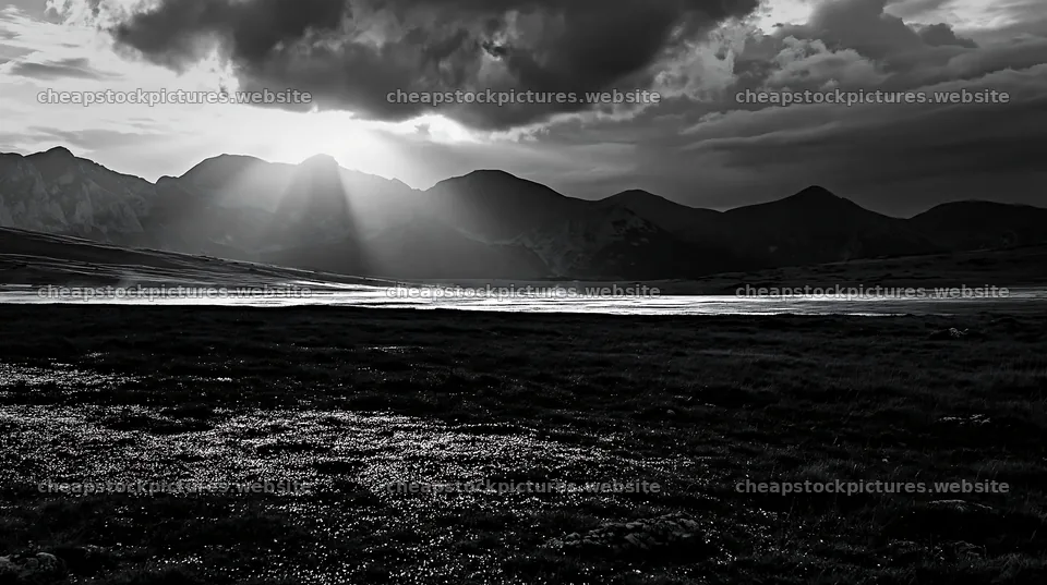 Light rays on Bucegi Mountains meadow at sunset – stock pictures 10608x5938