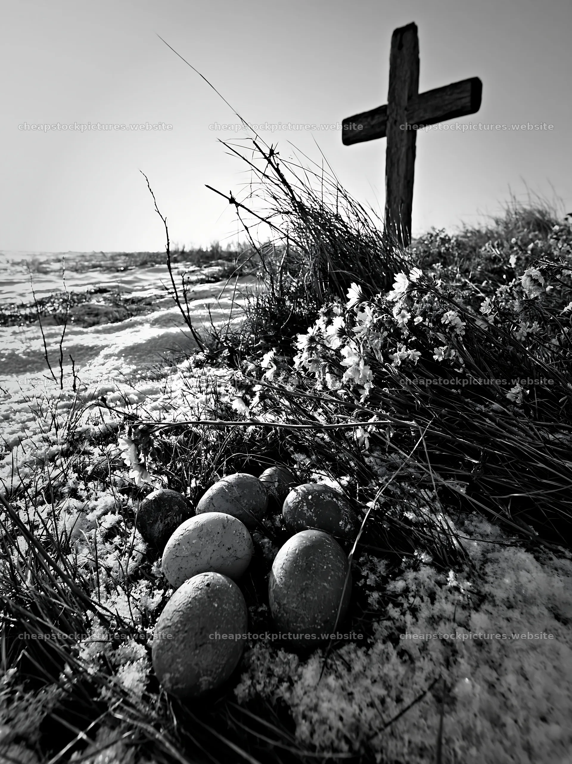 Weathered Christian cross in snowy meadow with eggs nearby – stock pictures 6866x9174