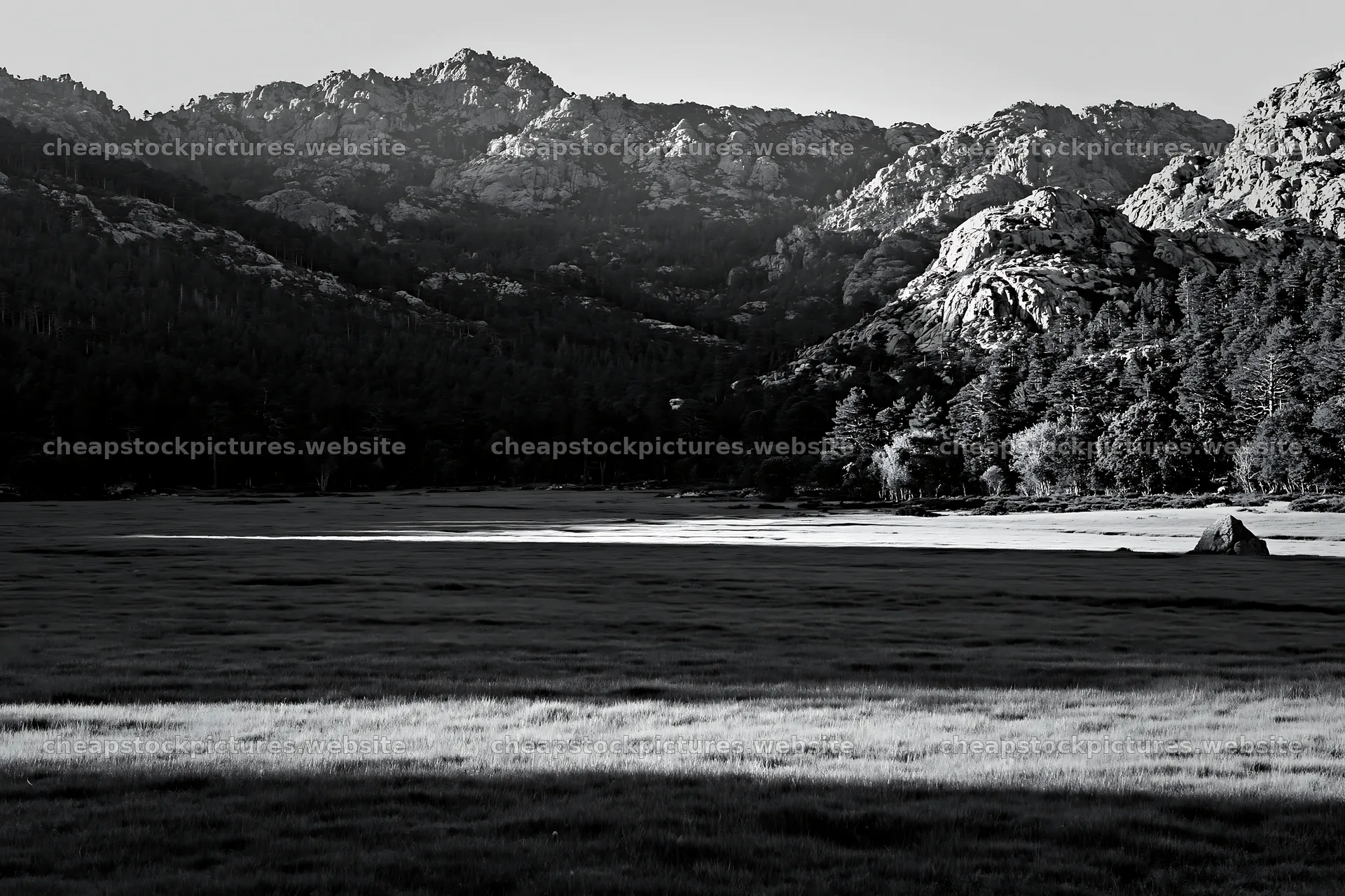 Mountain meadow with sunrays casting shadows on grass – stock pictures 9722x6480