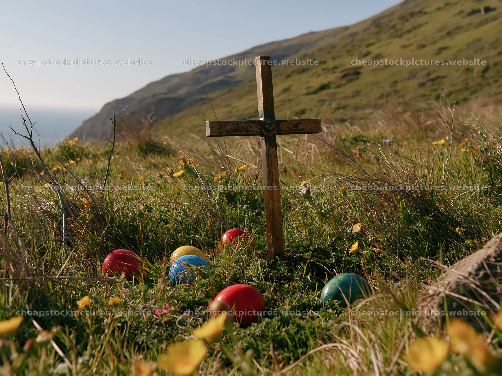 Christian cross in valley meadow with colorful eggs – stock pictures 9174x6866