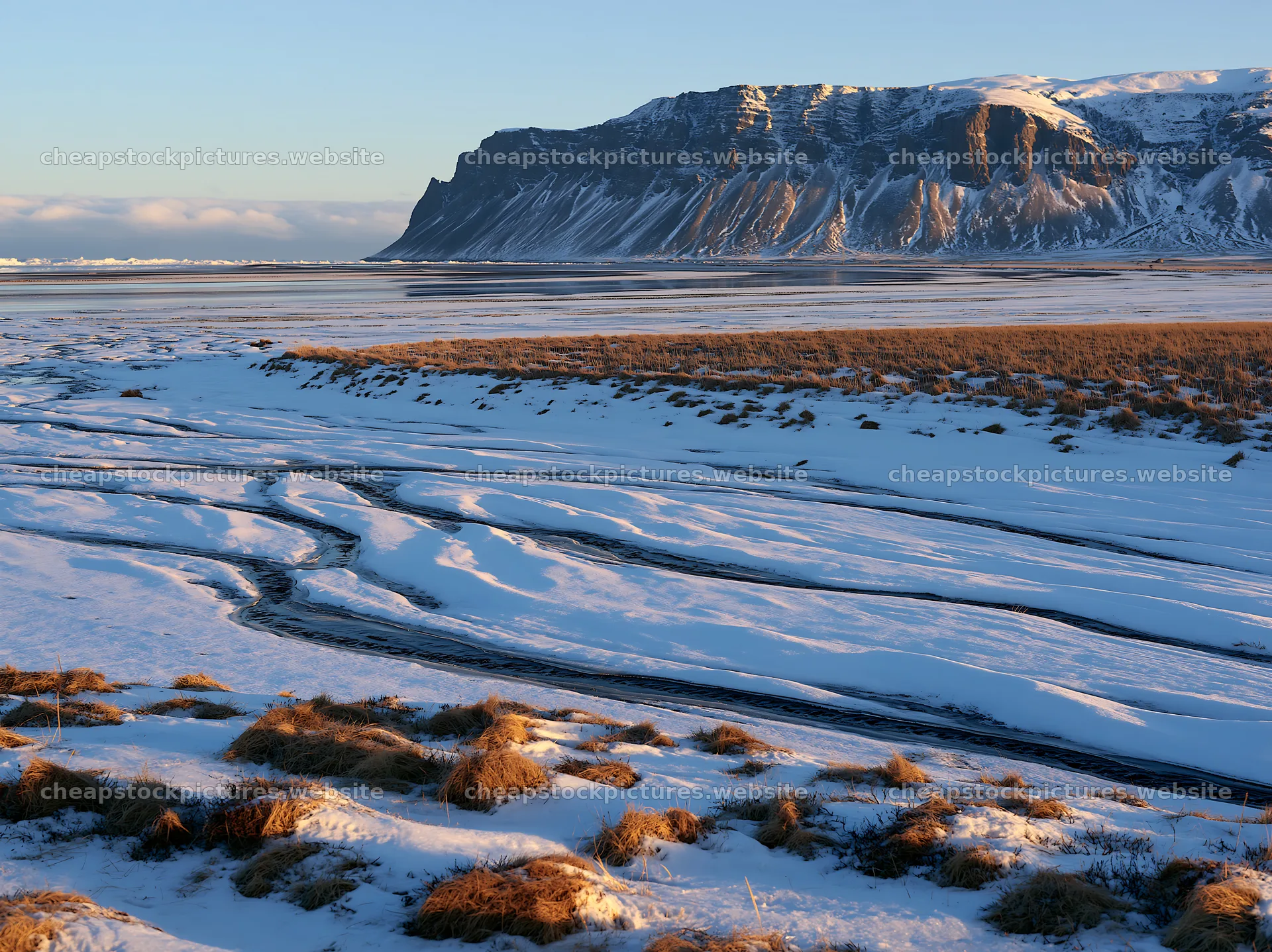 Snowbound meadow with mountains and snow-covered landscape – stock pictures 9174x6866
