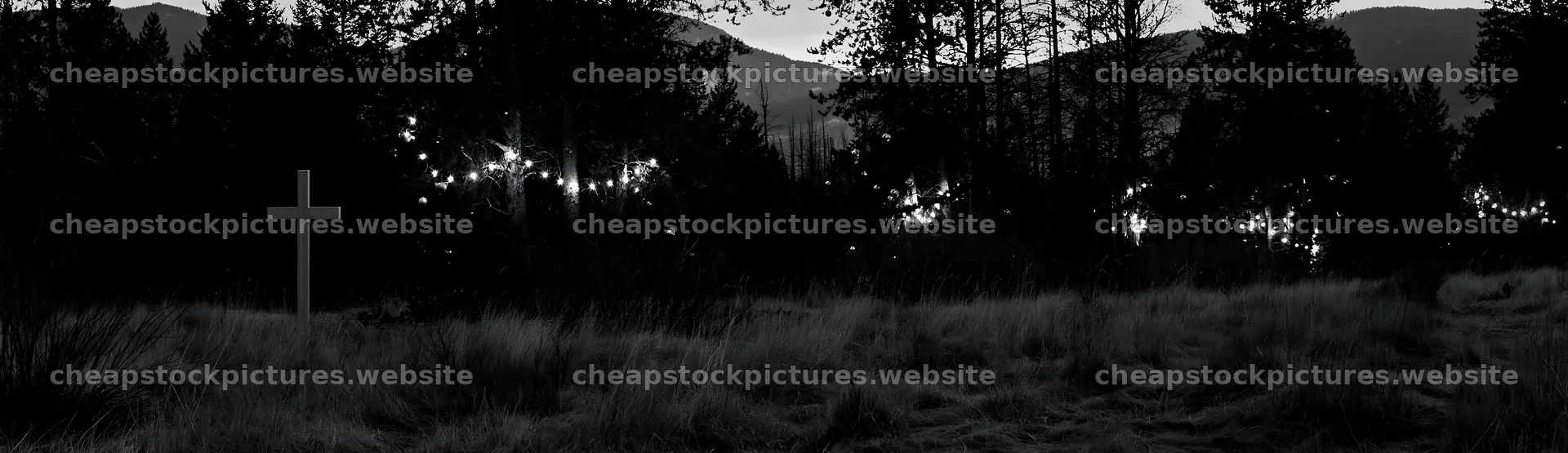 White Christian cross in a remote meadow at dusk – stock pictures 14762x4268