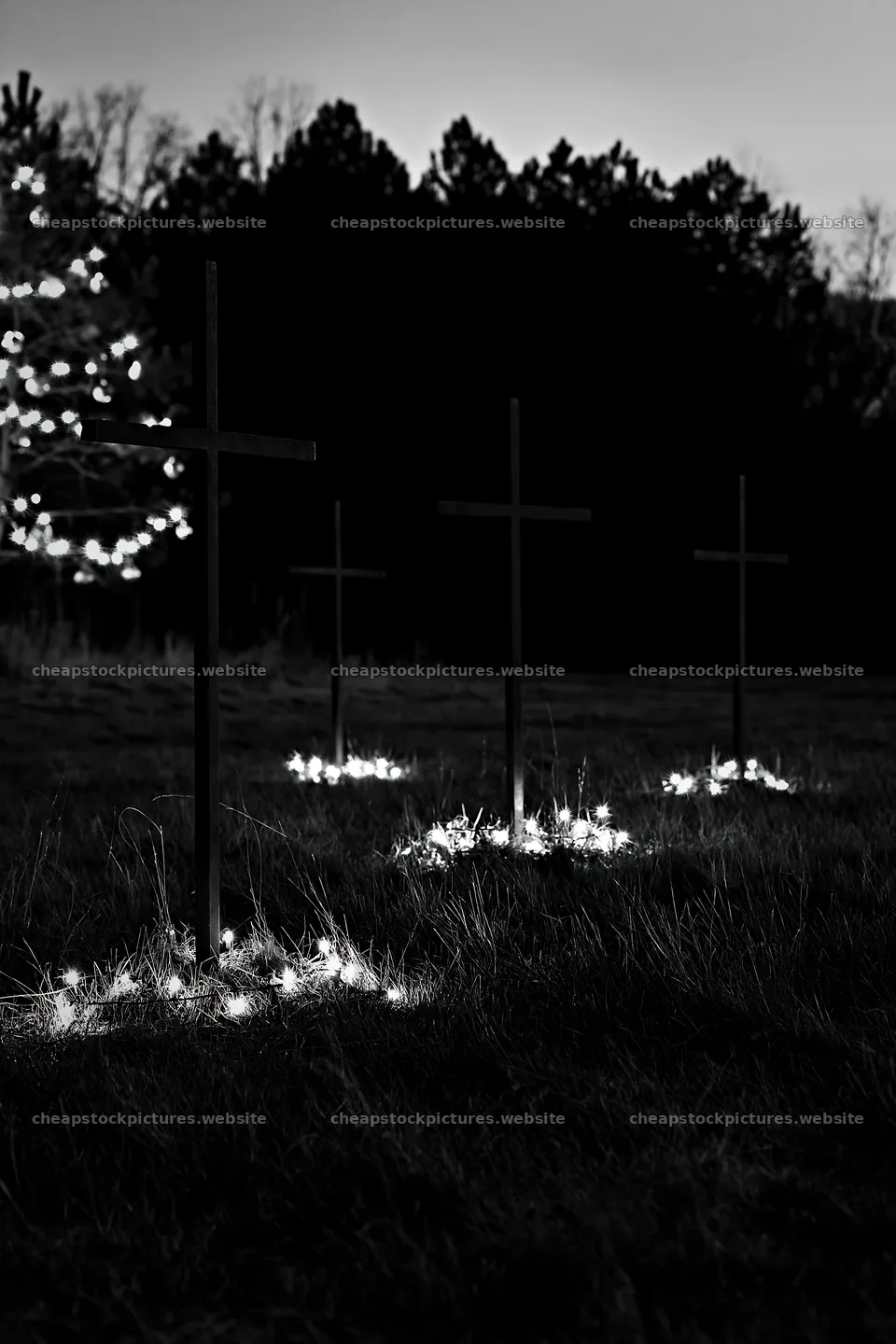 Christian crosses in meadow with lights at night – stock pictures 6480x9722