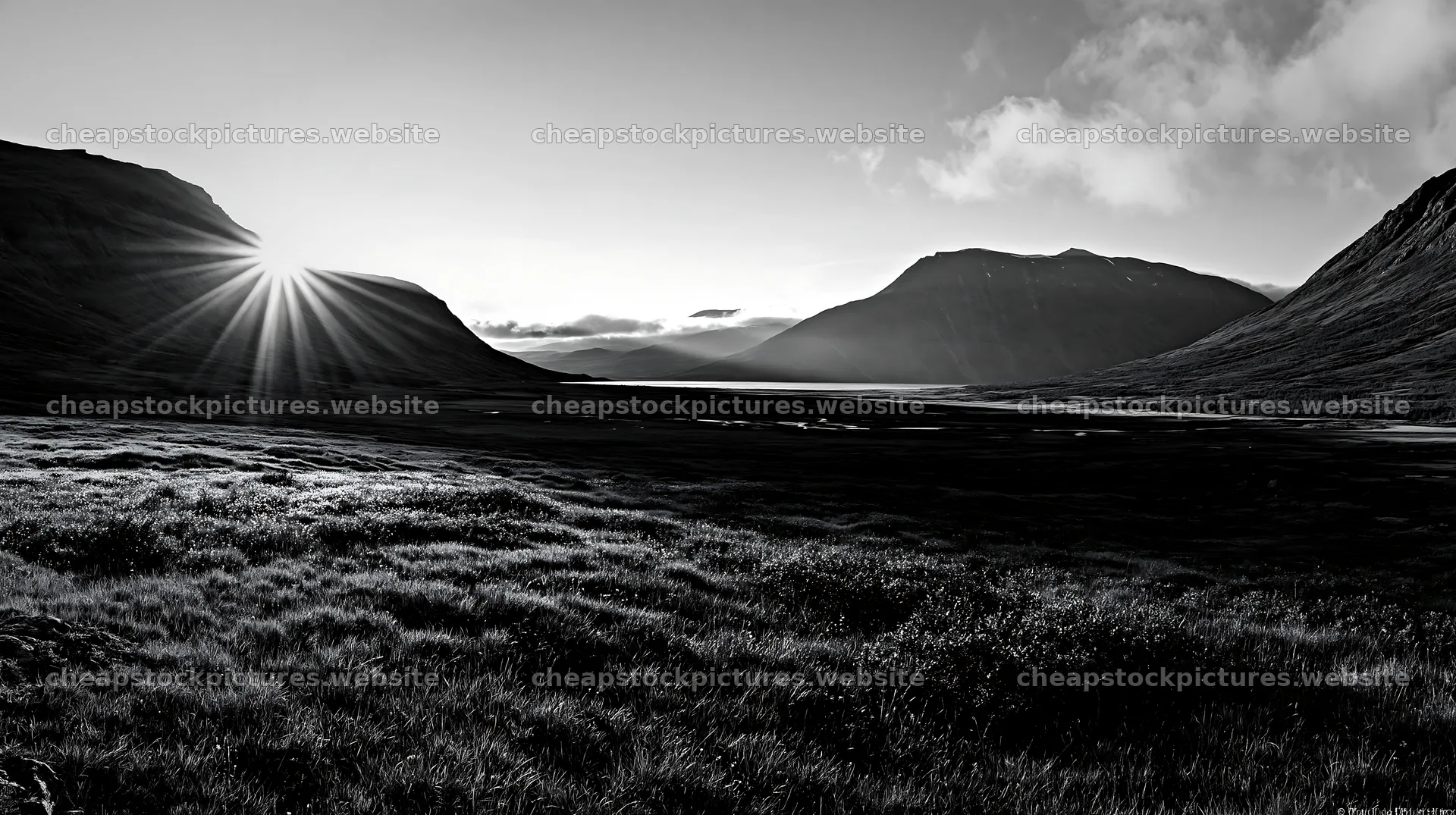 Sunbeams shining over Jotunheimen valley meadow – stock pictures 10608x5938