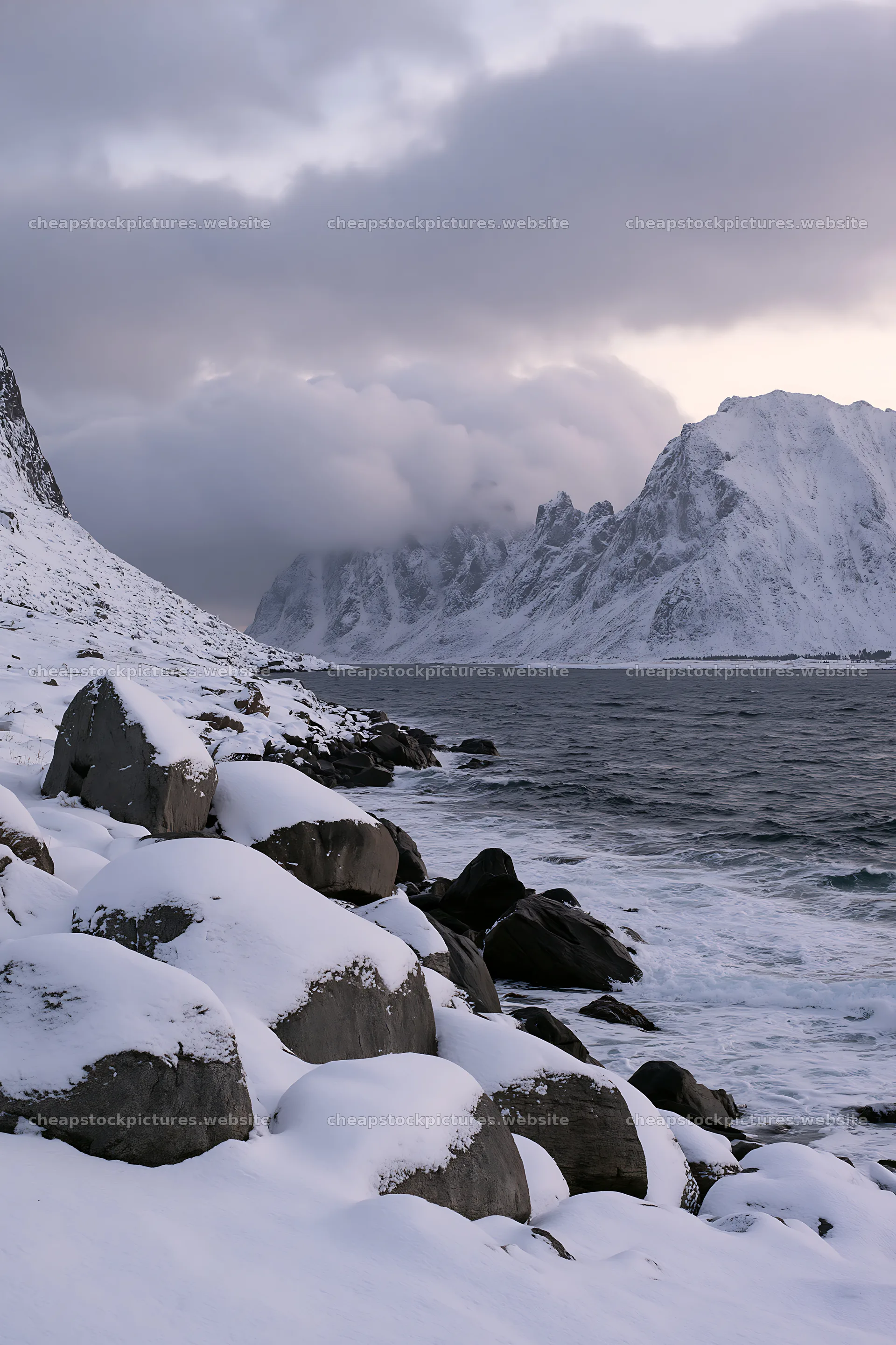 Lofoten coastal meadow winter snow under cloudy sky – stock pictures 6480x9722