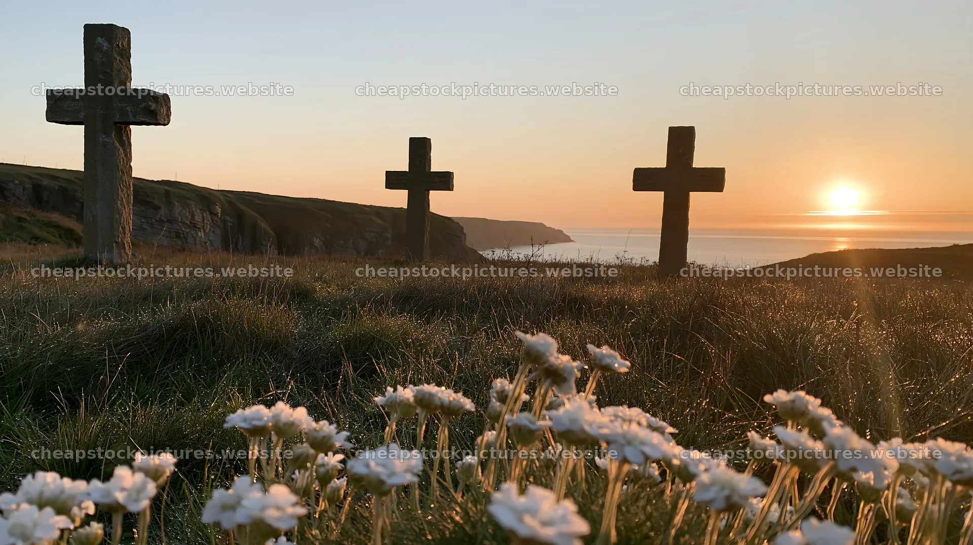 Three Christian crosses in Christmas meadow at sunrise – stock pictures 10608x5938