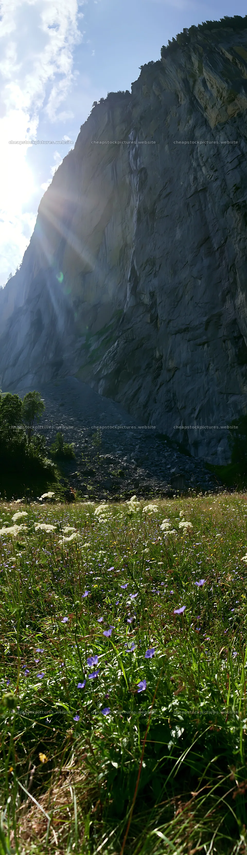 Lauterbrunnen Valley meadow light rays illuminate the landscape – stock pictures 4268x14762