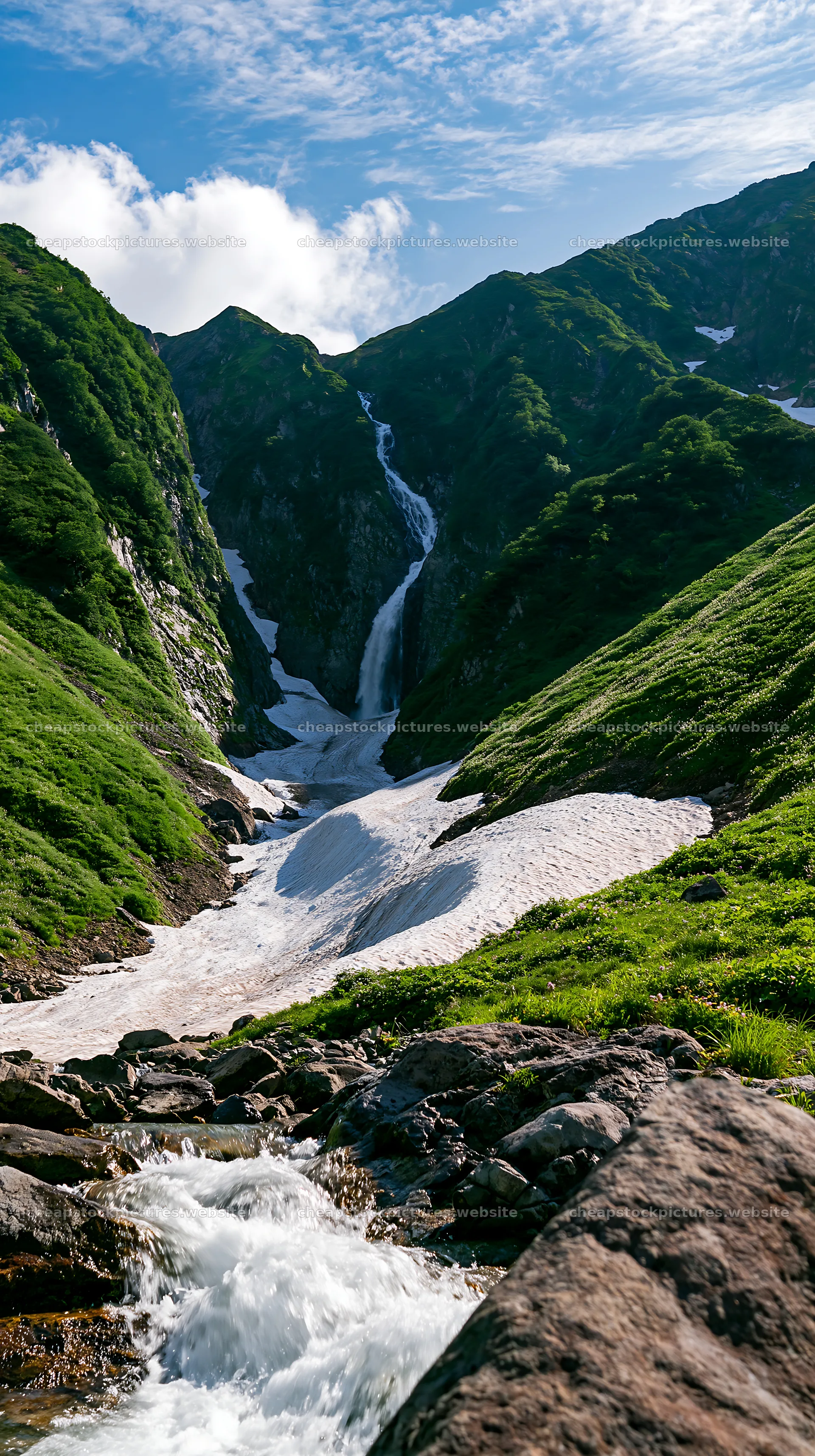 Snowmelt in Toyama alpine meadow with rocks and waterfall – stock pictures 5938x10608