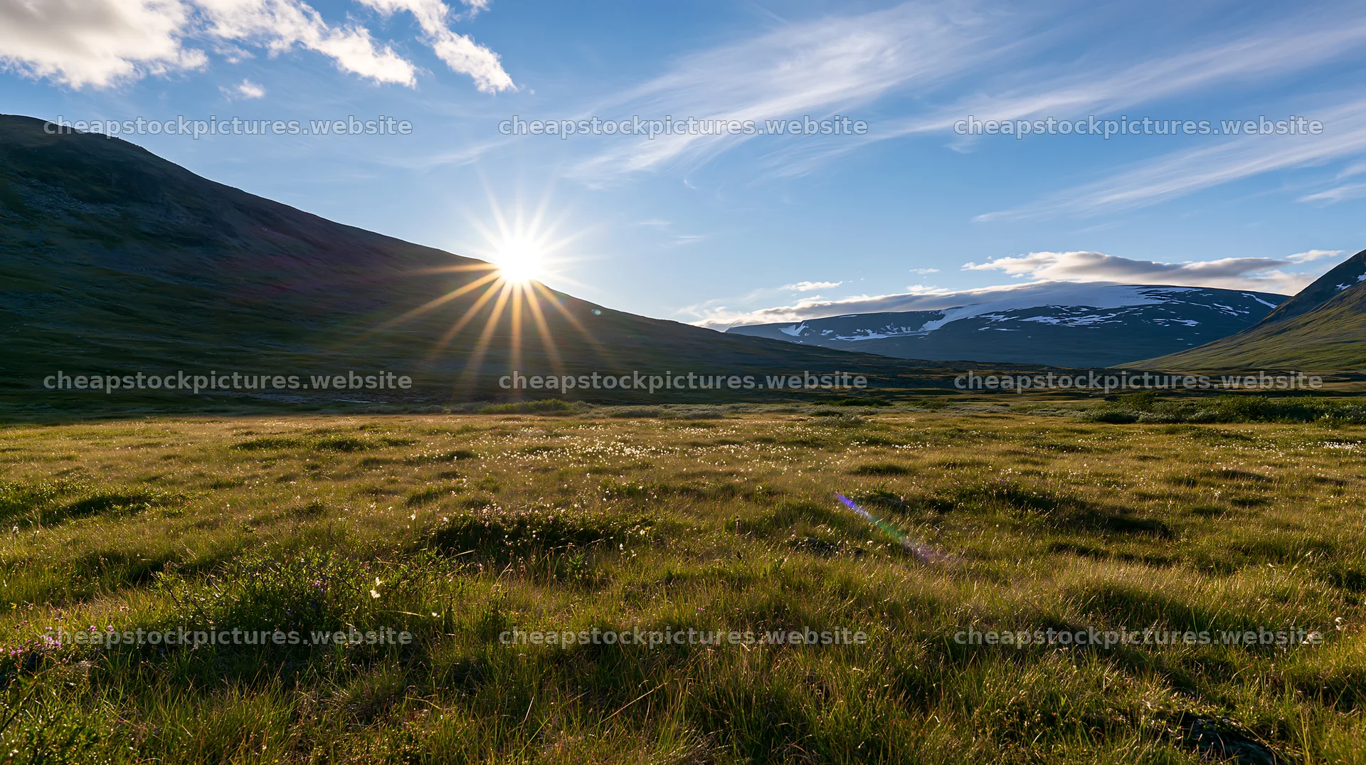 Sunbeams shining over Jotunheimen valley meadow – stock pictures 10608x5938