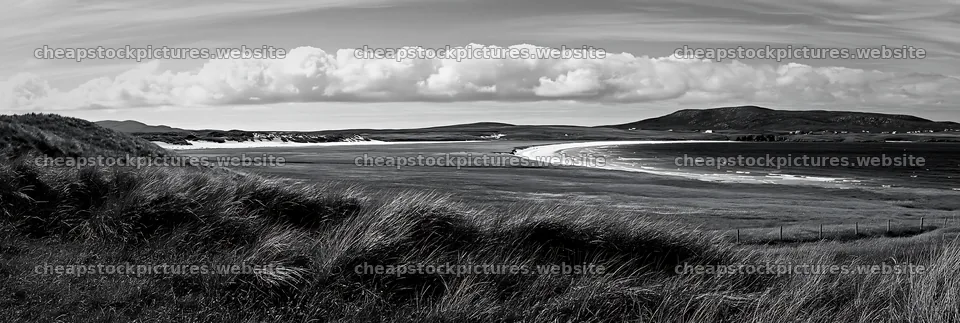 Machair beach meadow with rolling hills and cloudy sky – stock pictures 13690x4602
